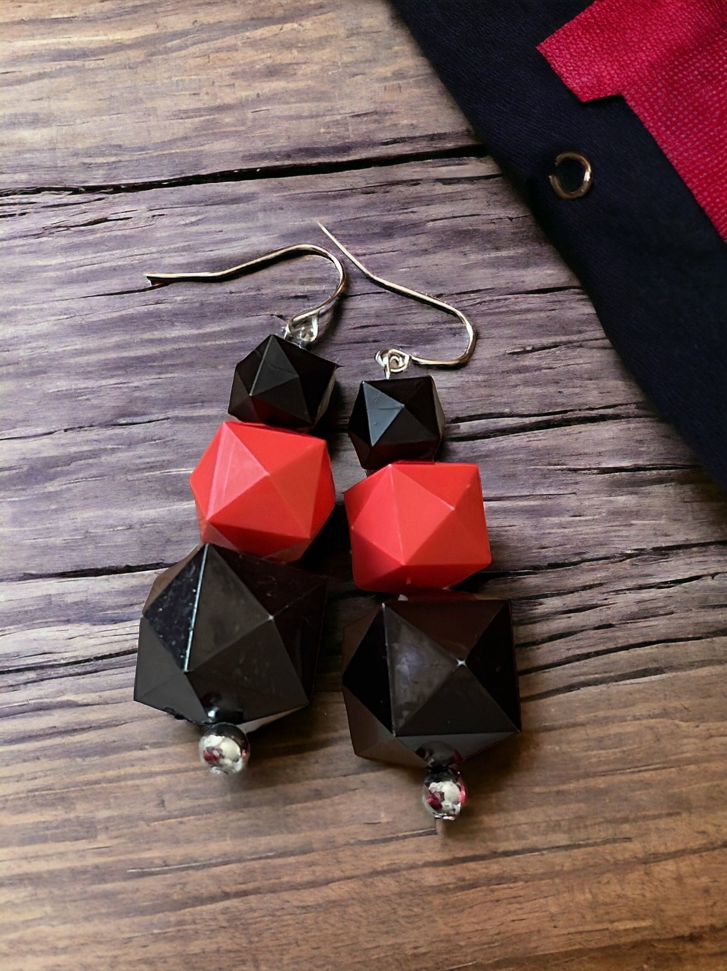 Your choice of coral or black faceted dangle earrings