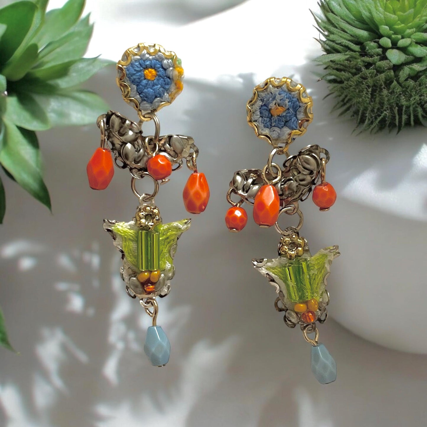 Handmade mixed media earrings made with embroidery from a vintage linen table runner, combined with glass, plastic, metal & fabric elements