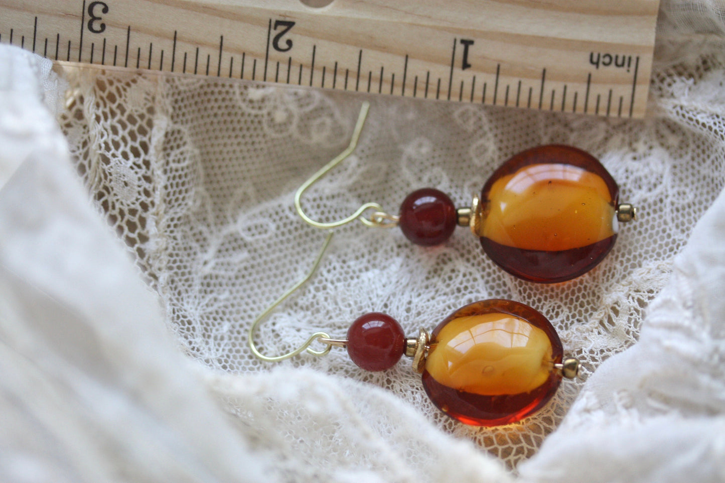 Orange and deep red dangle earrings
