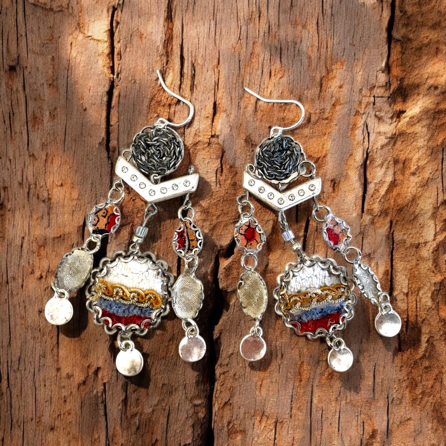 One-of-a-kind earrings made with fabric, velvet, lace, mixed metals, chain and rhinestone studded spacers. Sterling ear wires.