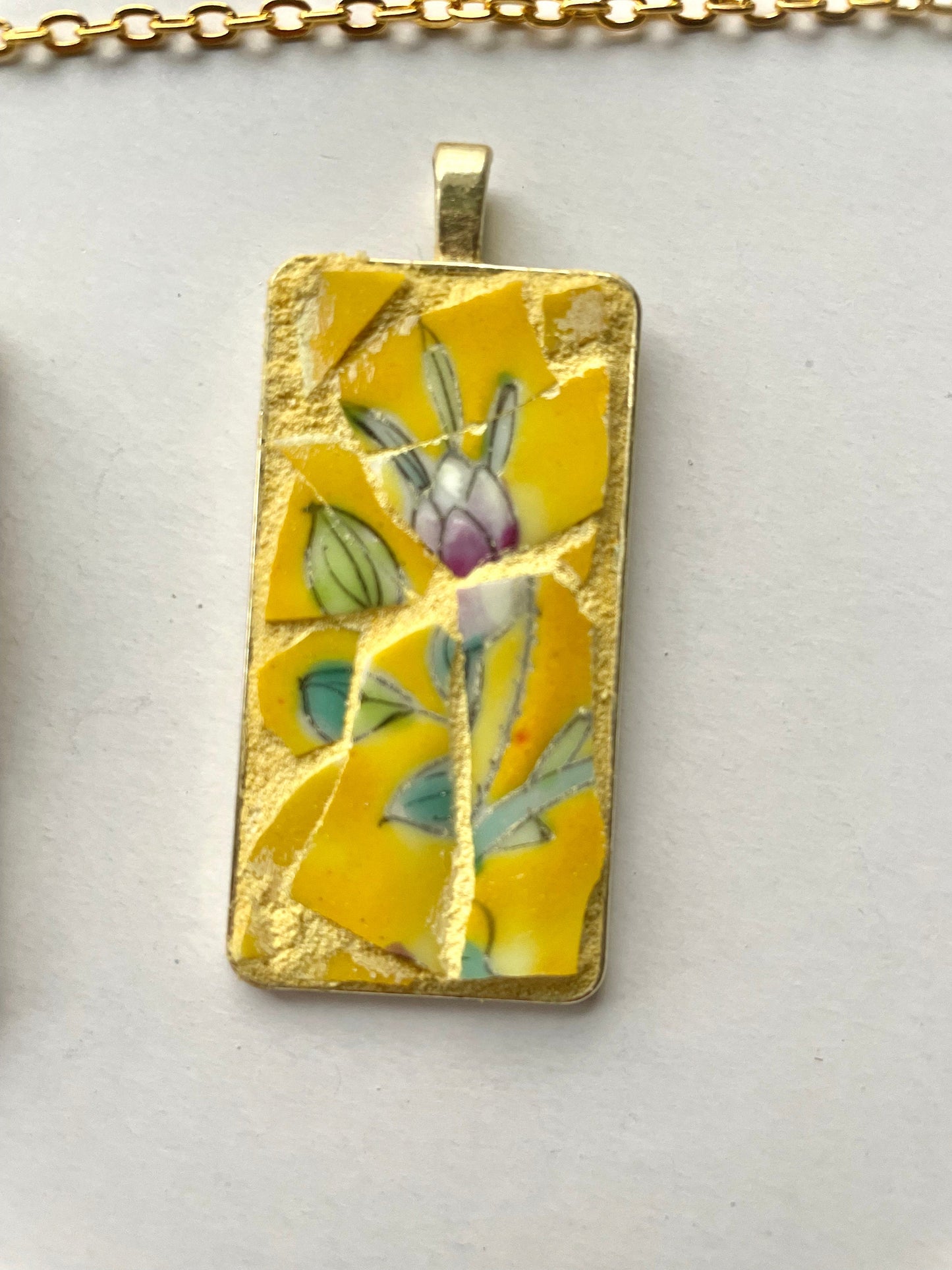 One-of-a-kind mosaic necklaces made from broken vintage dishes