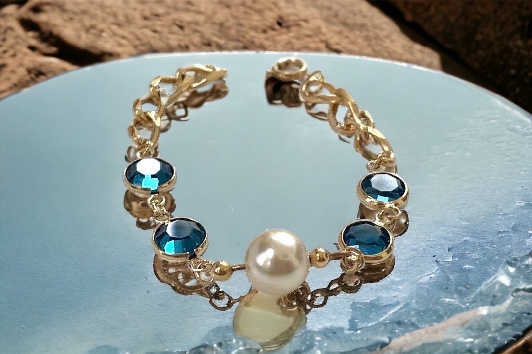 Blue crystal and faux pearl upcycled bracelet