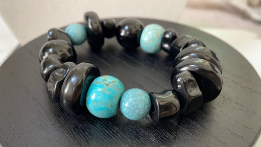 Stunning vintage mixed sizes and shapes of black and faux turquoise beaded bracelet