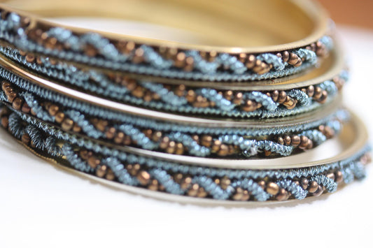 Set of 4 beautiful beadwork and metal bangle bracelets