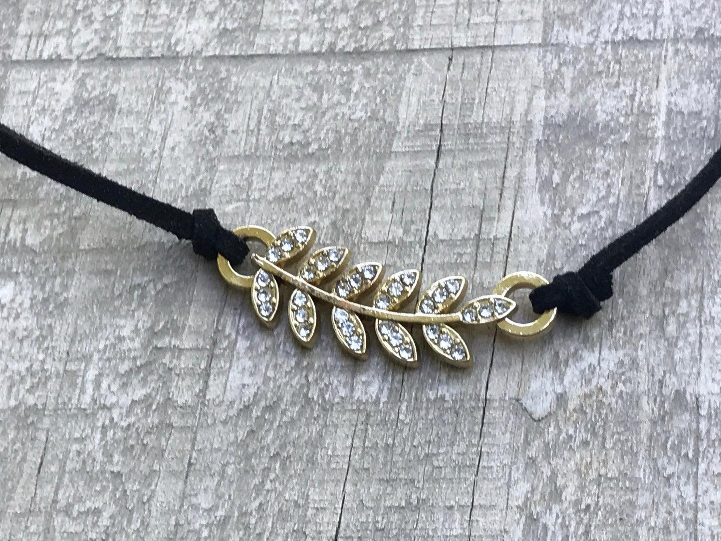 Vintage Rhinestone feather on black vintage necklace