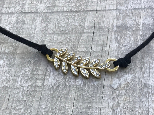 Vintage Rhinestone feather on black vintage necklace