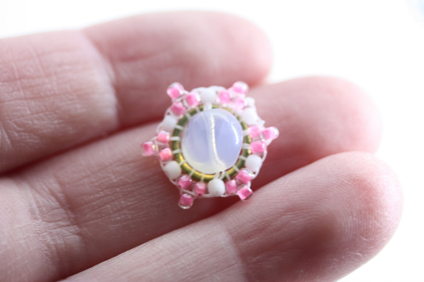 Hand beaded stud earrings - pink and white beadwork around transluscent opalescent glass bead