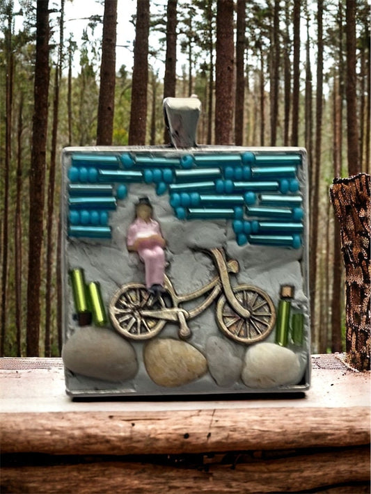 My own handmade micro mosaic mixed material collage necklace - woman resting on her bicycle