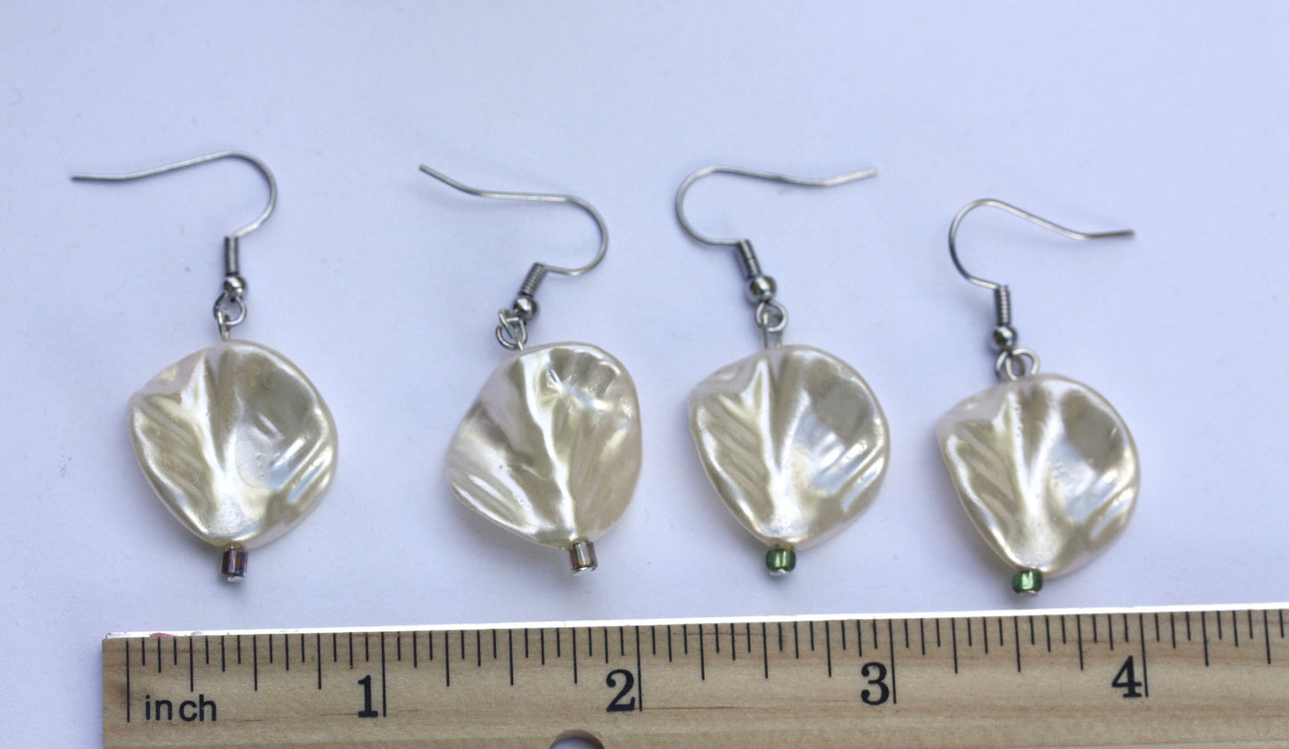 Pearlescent leaves dangle earrings trimmed with tiny sparkly seed beads