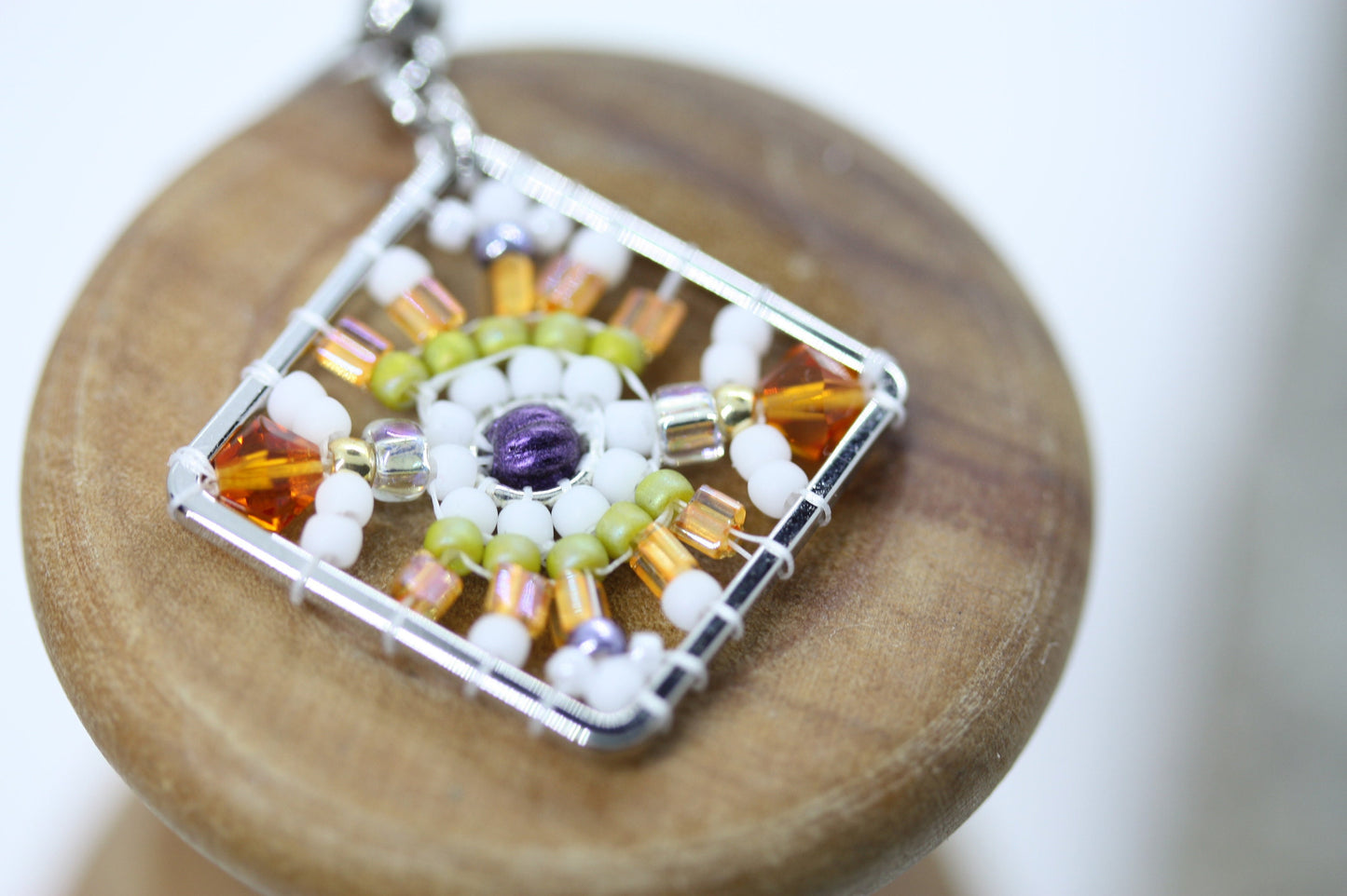 Orange, green, purple and white crystal and intricate beadwork small square dangle earrings
