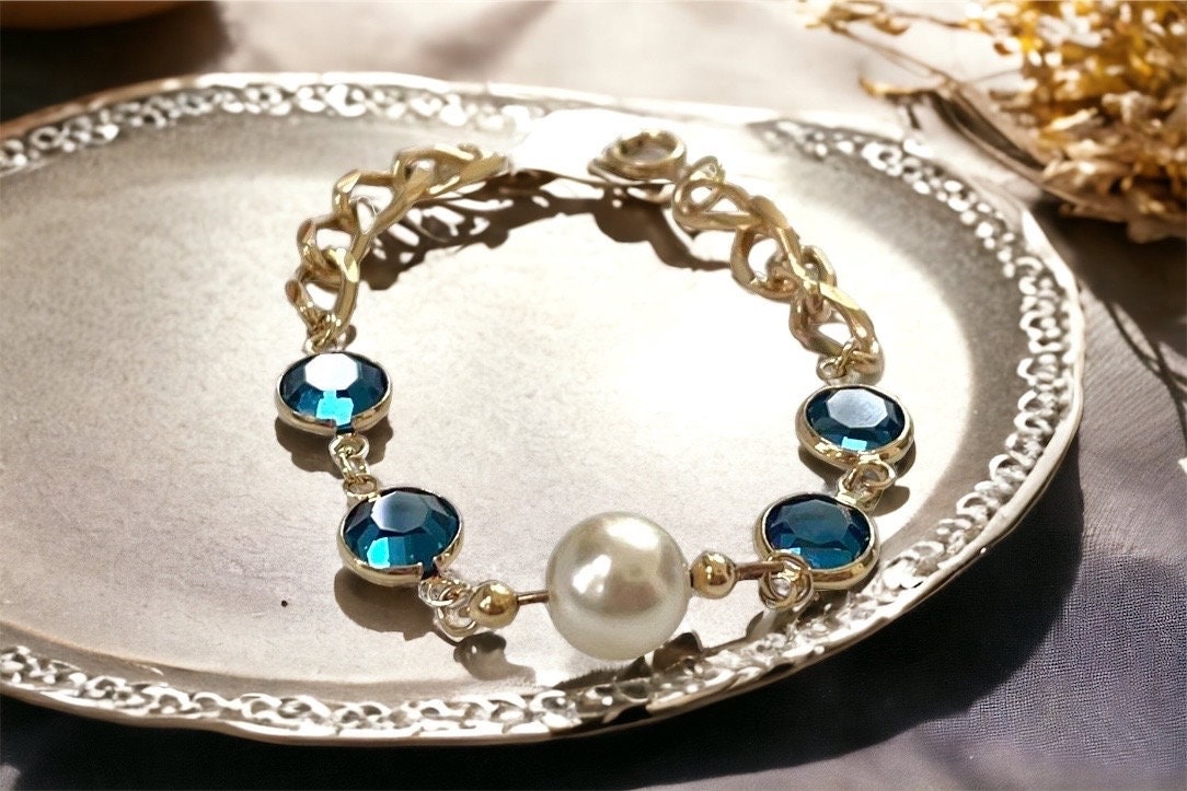 Blue crystal and faux pearl upcycled bracelet