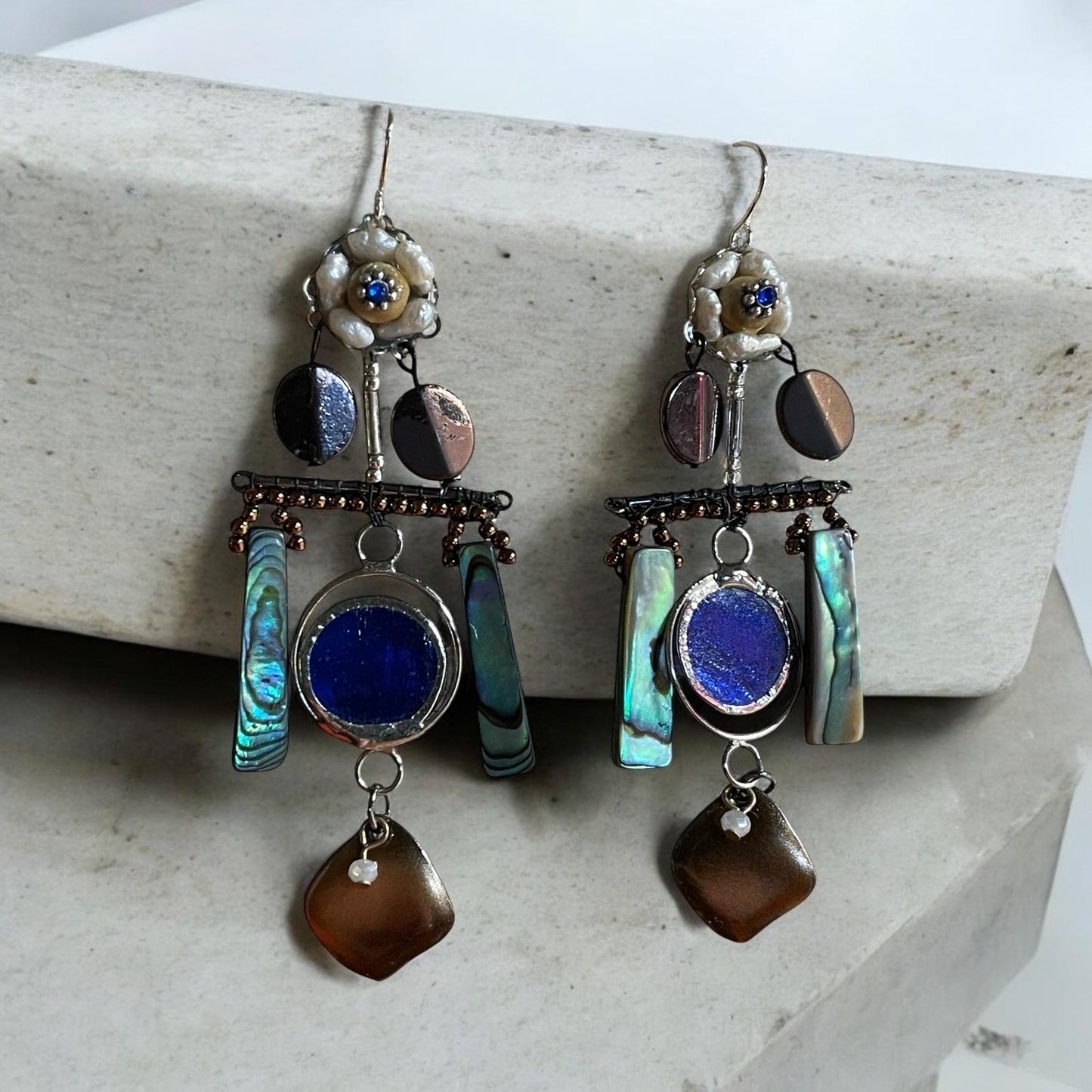 Abalone mixed media collage earrings with mixed metals and findings, pearls, wood, beadwork and abalone shells; Sterling silver ear wires