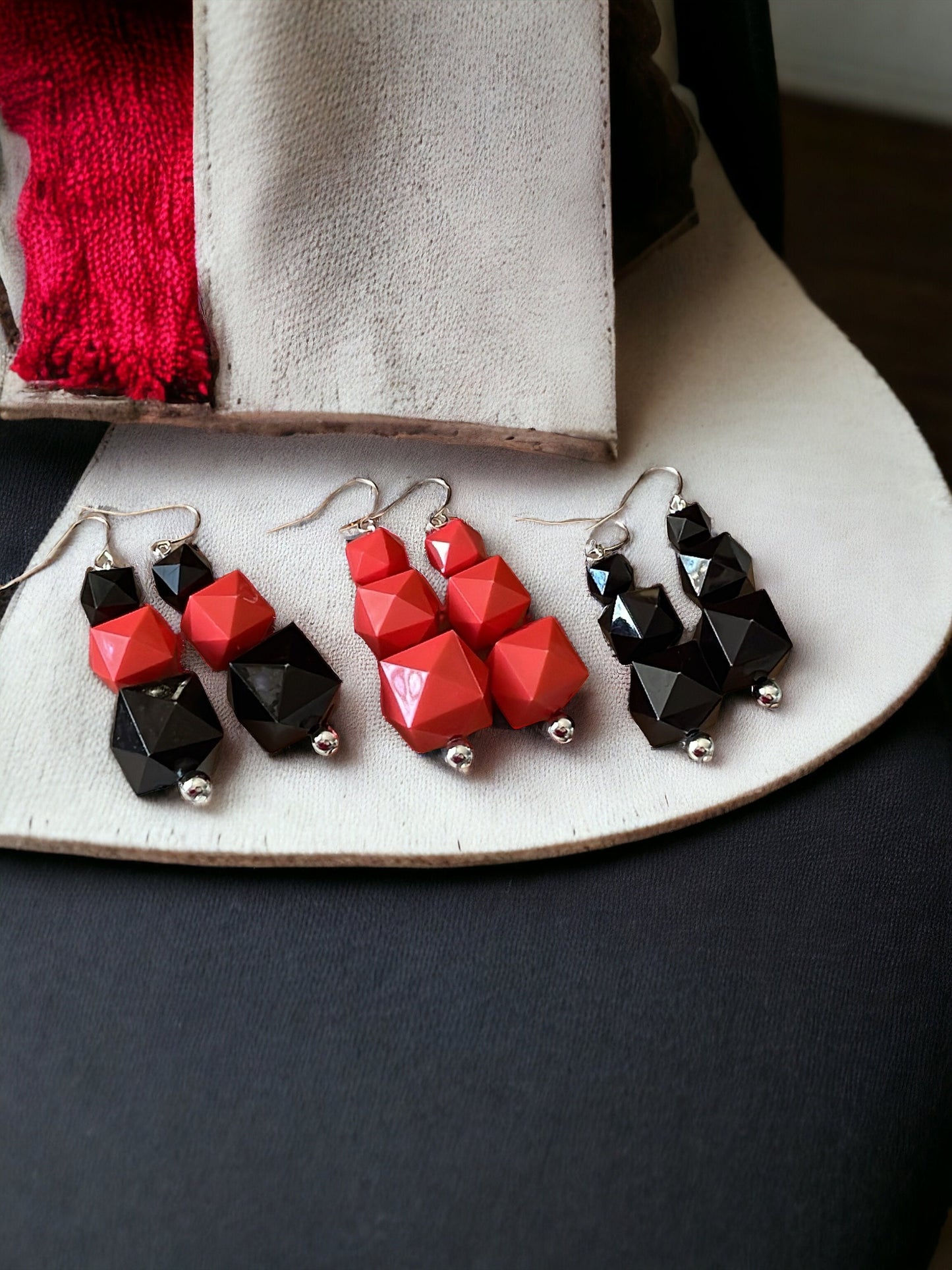 Your choice of coral or black faceted dangle earrings