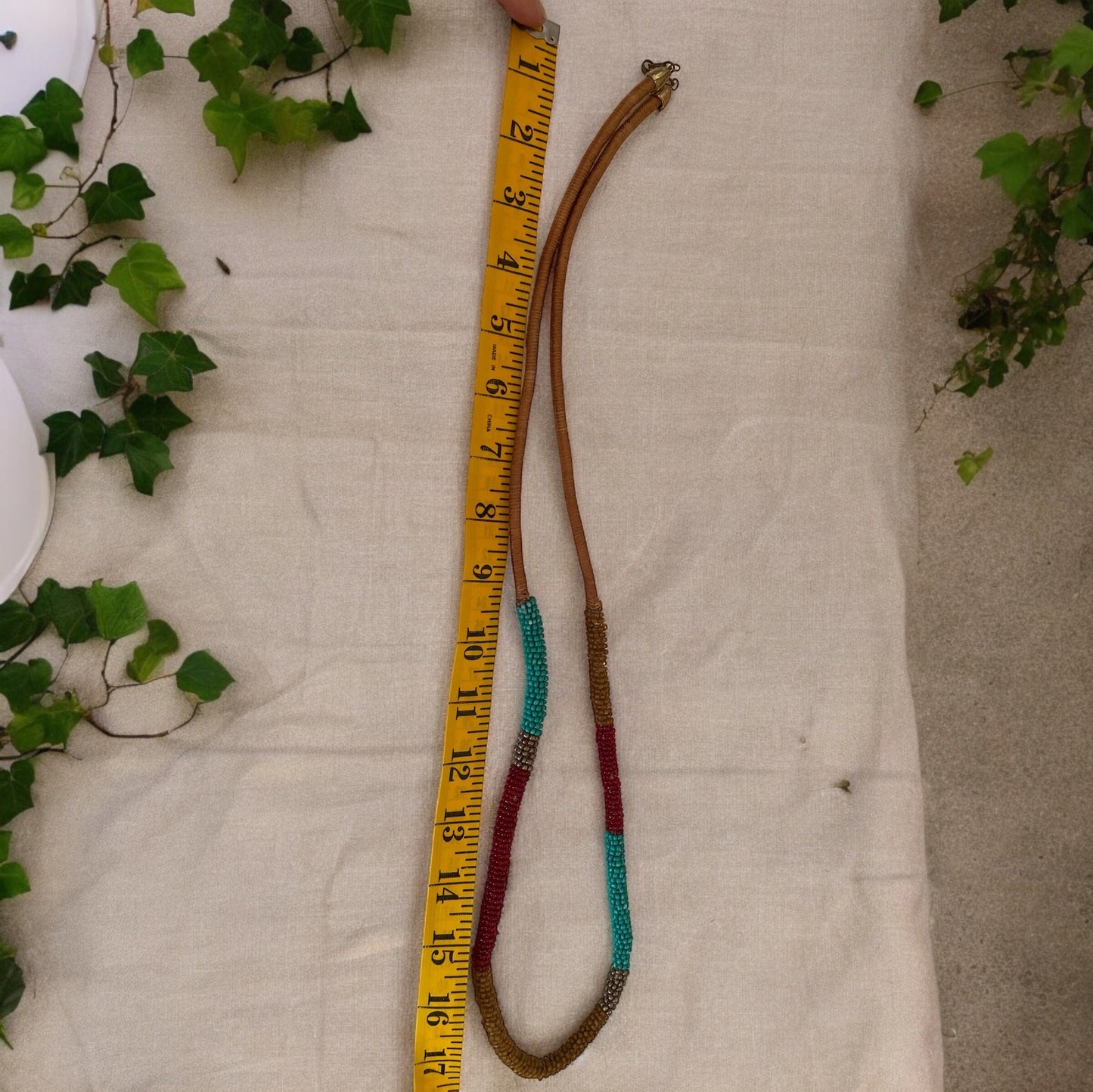 Stunning silk wrapped earth tone beaded long vintage necklace