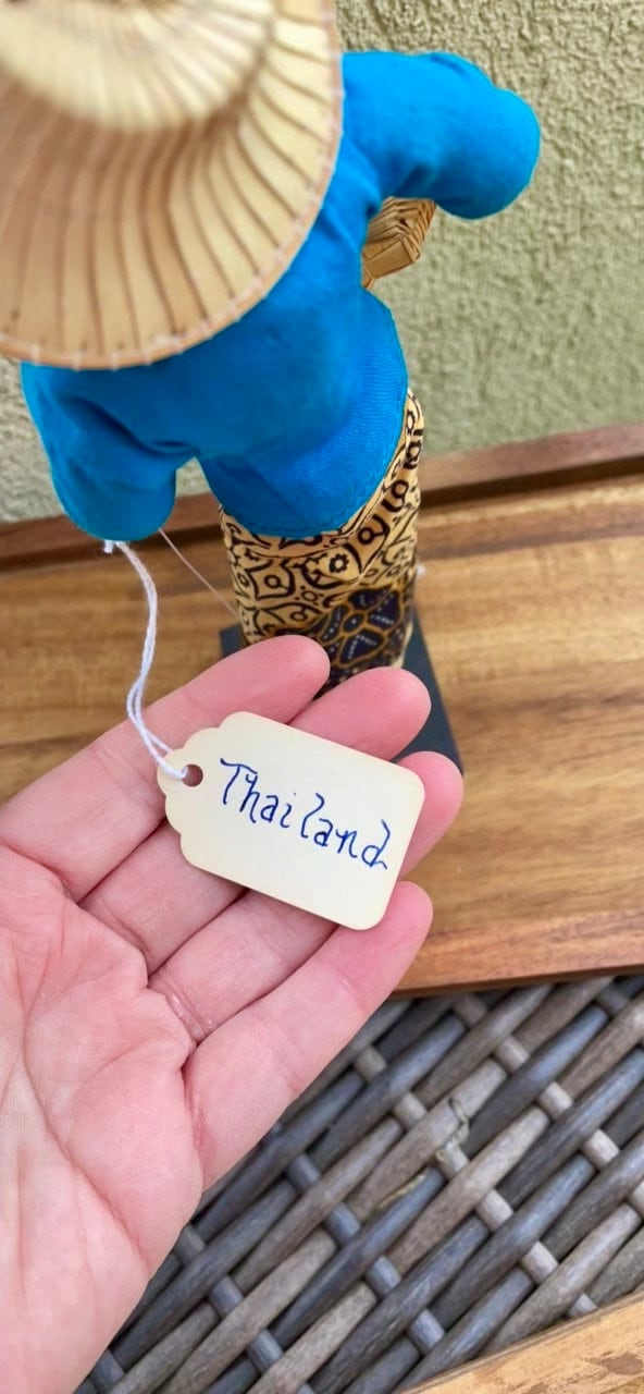 Stunning vintage collectible doll figurine - made in Thailand - woman in straw hat with a basket, blue top, orange buttons, handmade skirt