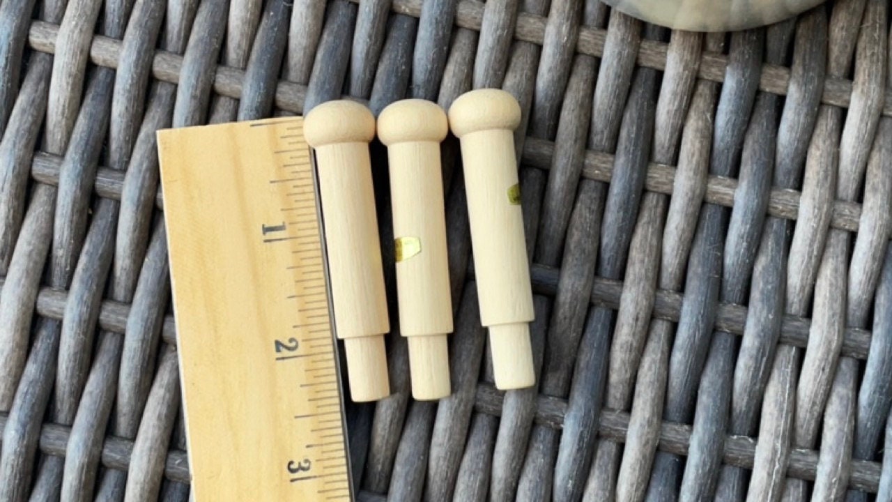 Unfinished solid wood pegs - great as craft supplies - for coat racks, doll making, wood sculptures, mixed material projects, etc.