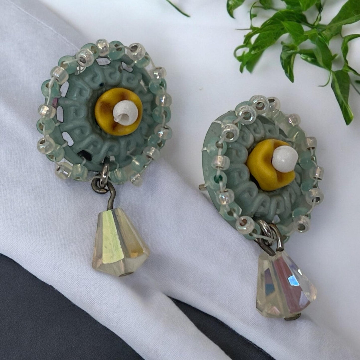 Stud earrings made of hand beaded vintage buttons with crystals