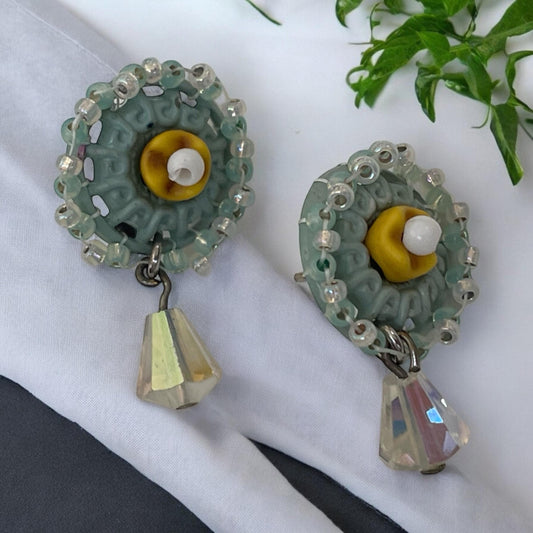 Stud earrings made of hand beaded vintage buttons with crystals