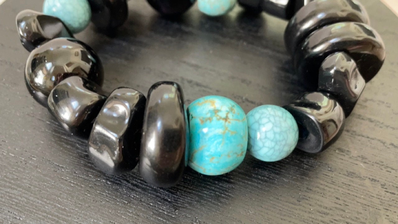 Stunning vintage mixed sizes and shapes of black and faux turquoise beaded bracelet