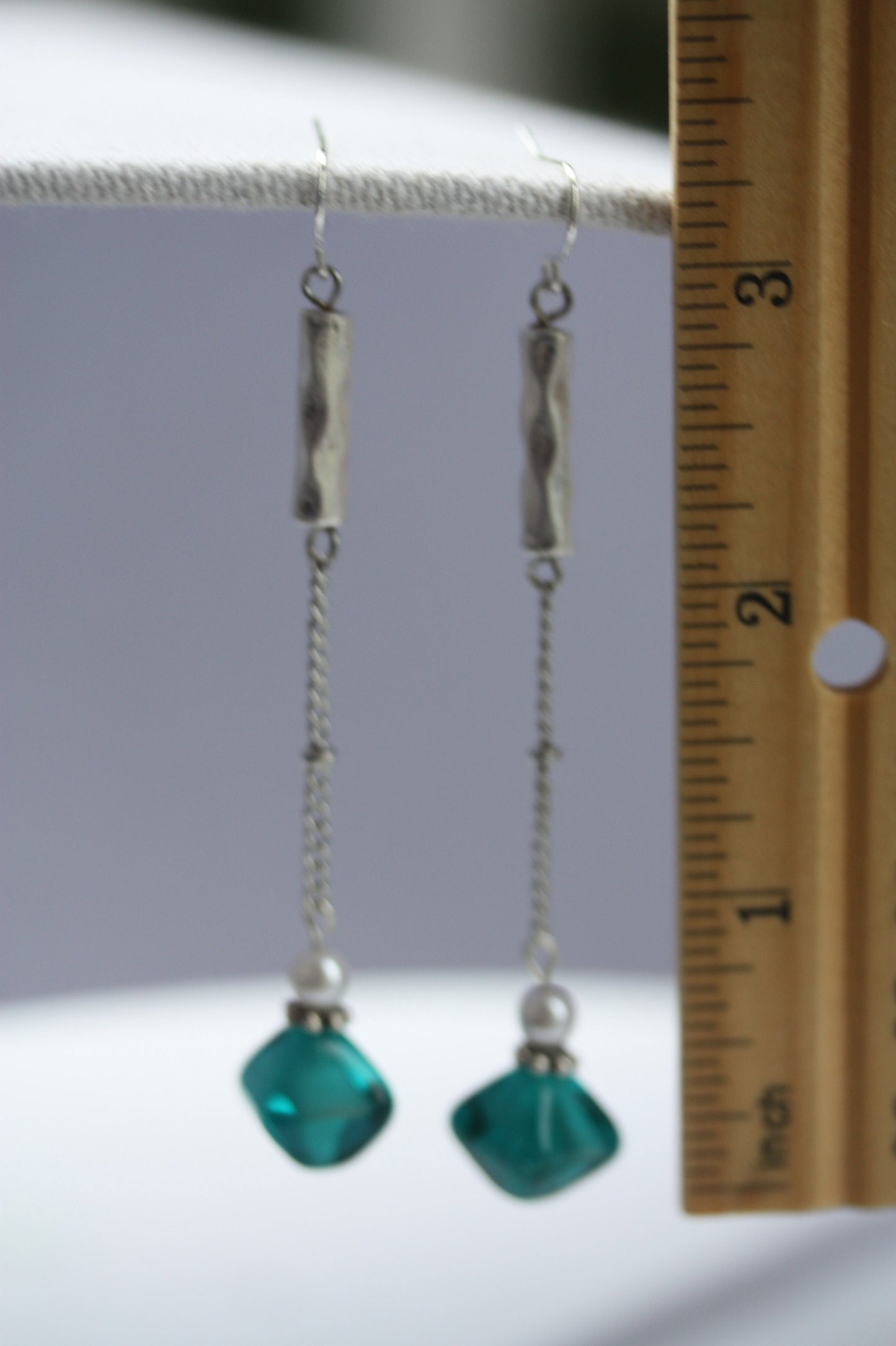 Long mixed material silver chain earrings with silver bars, faux baby pearls and triangular turquoise glass