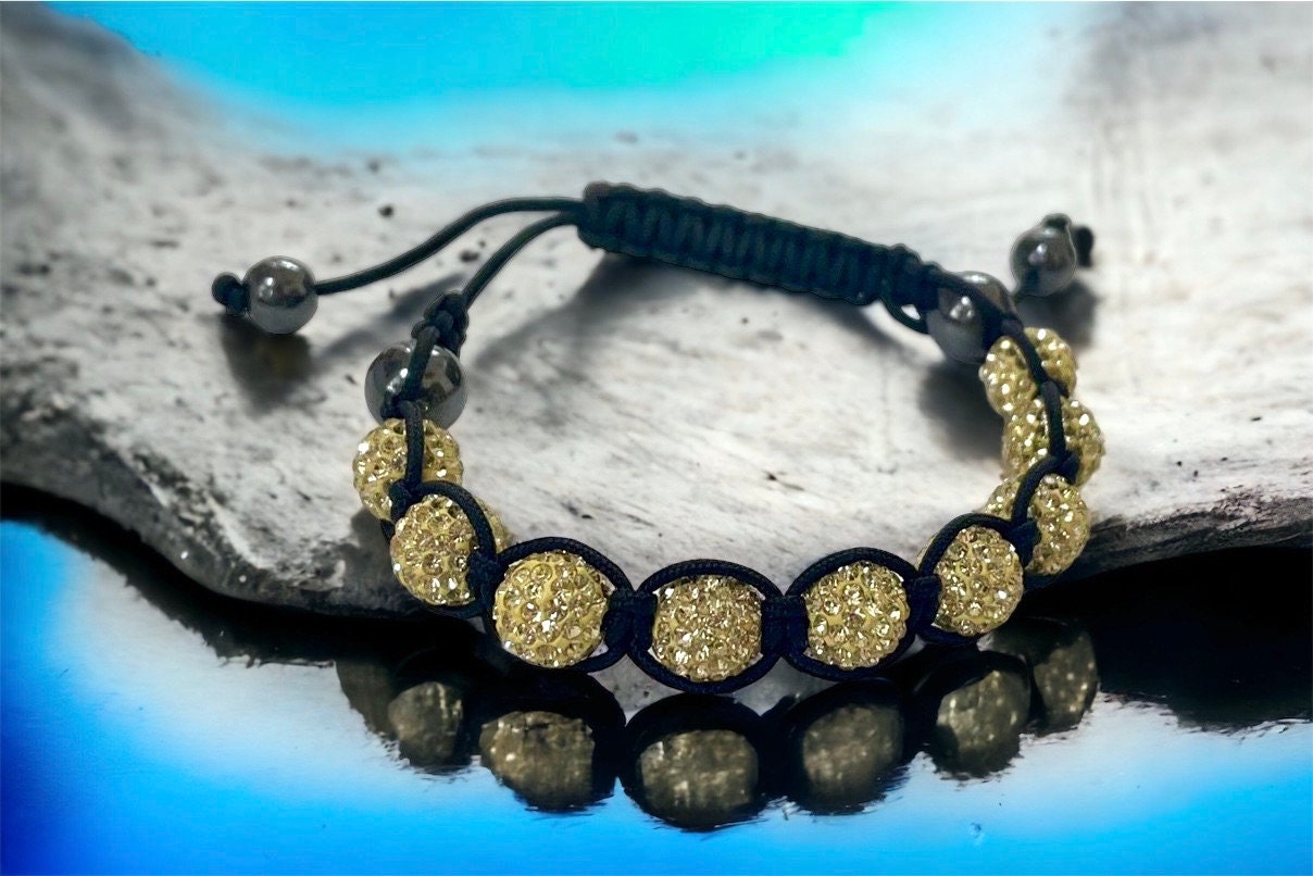 Sparkly black and yellow goldtone bracelet with hematite beads - adjustable