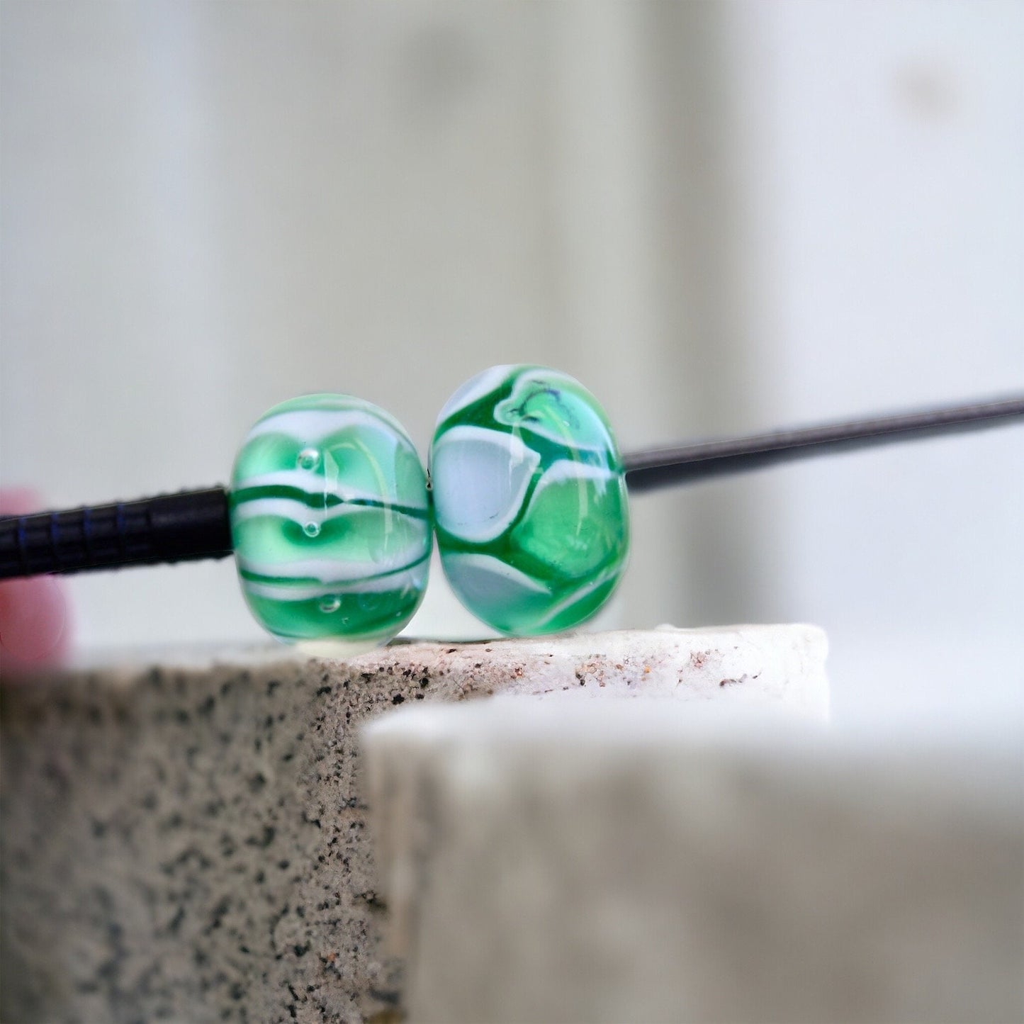 Two stunning vintage glass beads - shades of green and white
