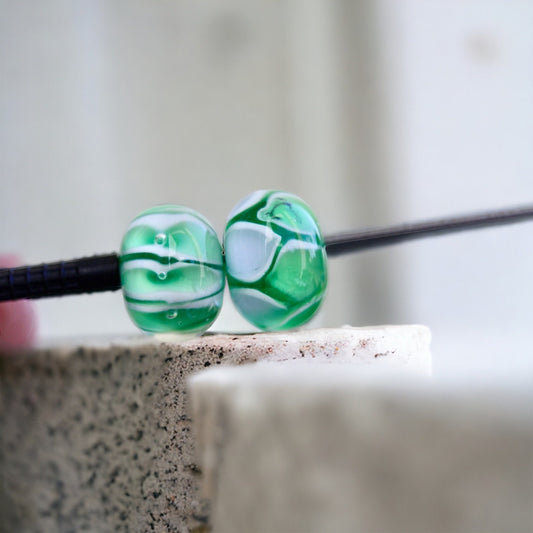 Two stunning vintage glass beads - shades of green and white