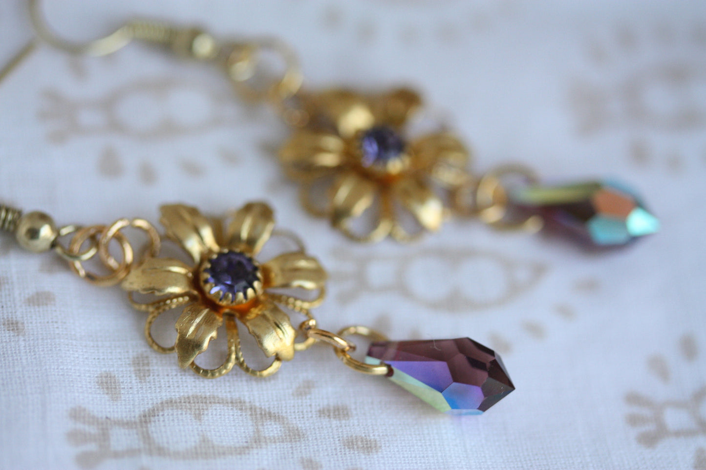 Handmade earrings - made up of vintage & new components - gold flowers with purple rhinestones and crystal dangles