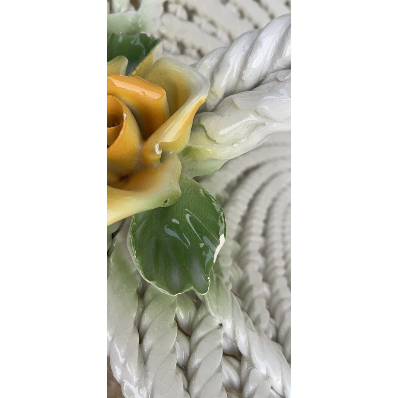 Magnificent huge woven Capodimonte porcelain basket with yellow flowers and green leaves, Made in Italy, hand painted