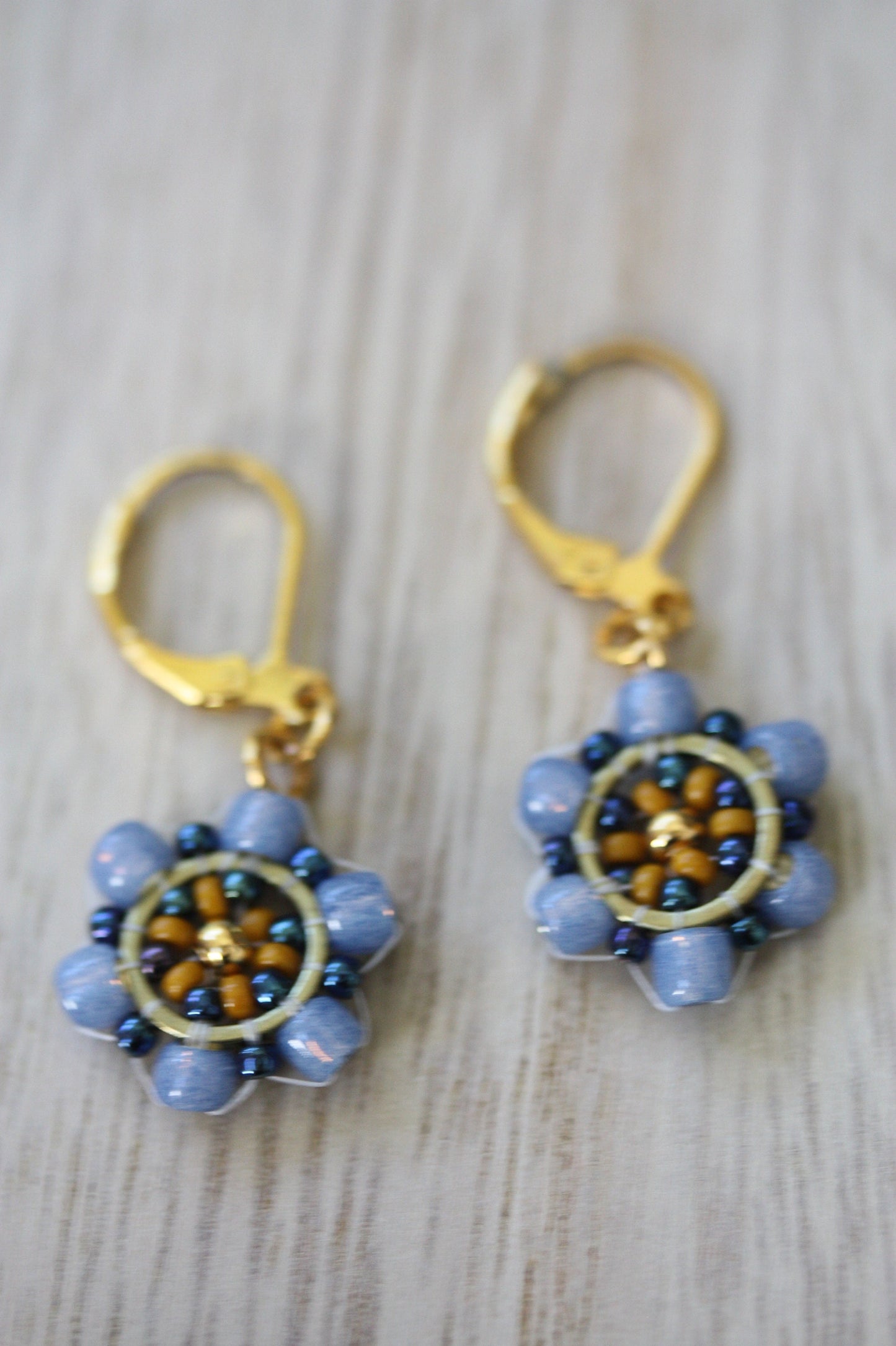 Tiny little dangles hand beaded seed bead  earrings - shades of blue and gold with goldtone center