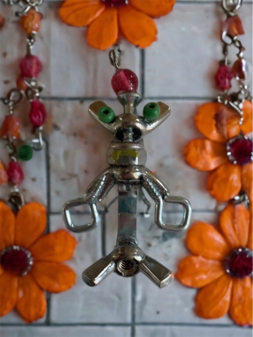 Meet "Herman" -  mixed media robot made of hardware - nails, screws, bolts with small wood/glass embellishments - pin or necklace pendant