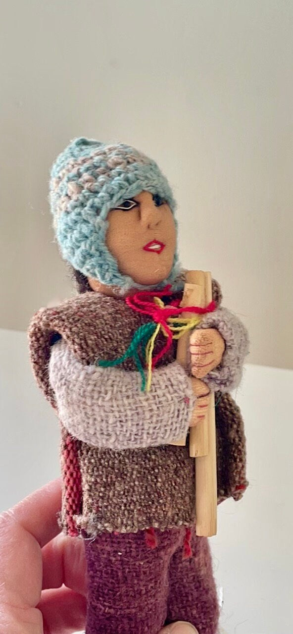 Vintage Bolivian man playing panpipes - collectible folk art doll with handmade woven wool clothing