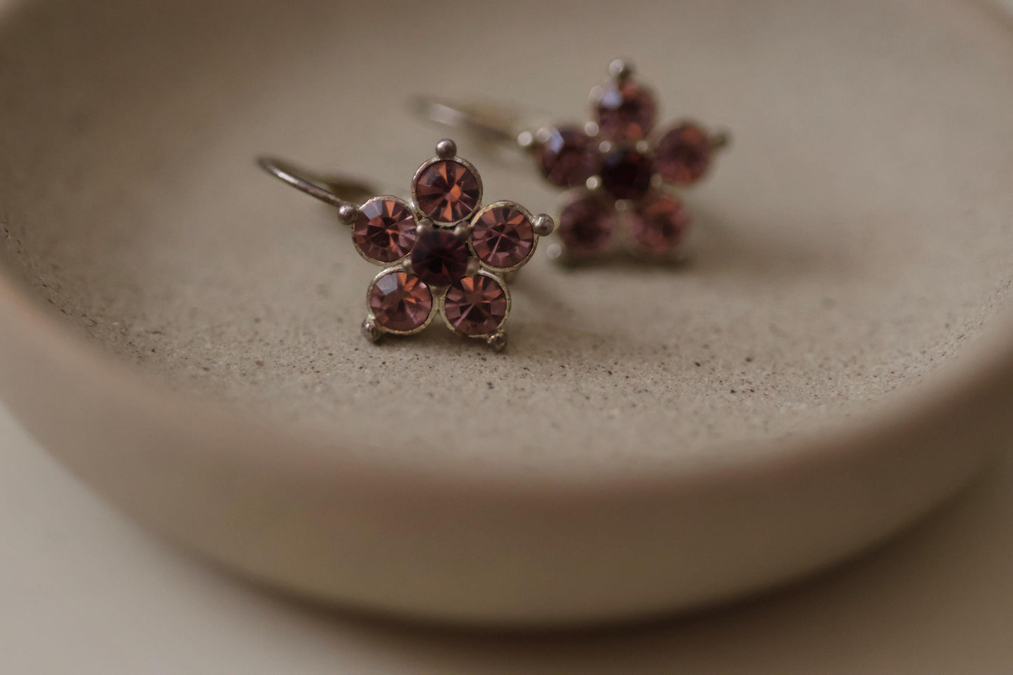 Shades of purple rhinestone flower stunning little vintage dangle earrings - 3/4"