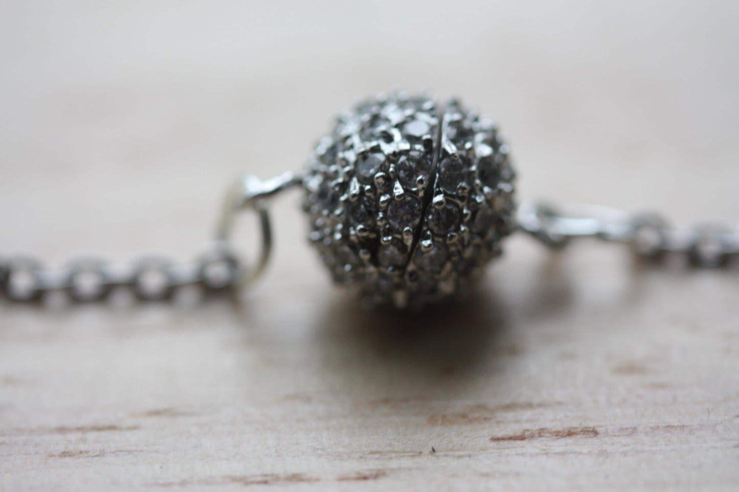 Handmade bracelet made with unique round marcasite ball that is the focal point and also unwinds as the clasp