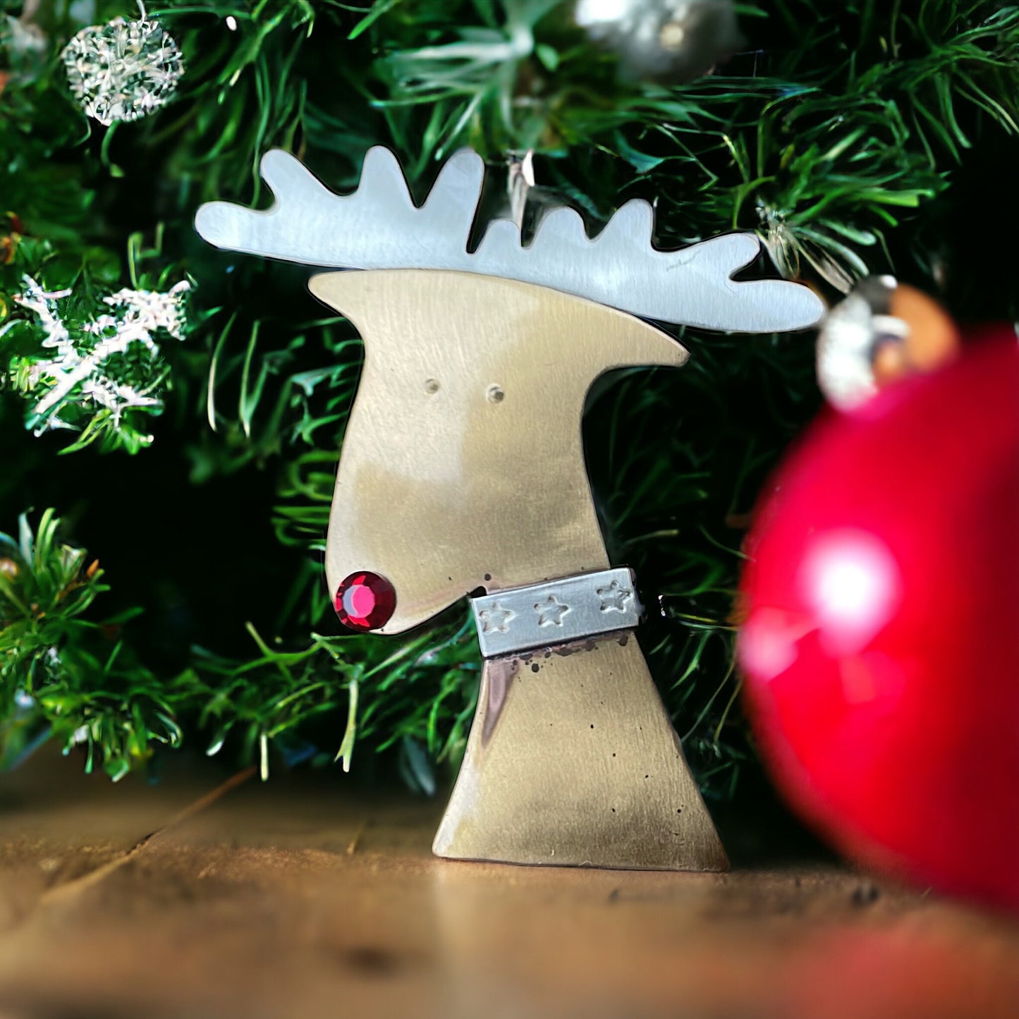 Mixed metal vintage reindeer pin with red rhinestone nose