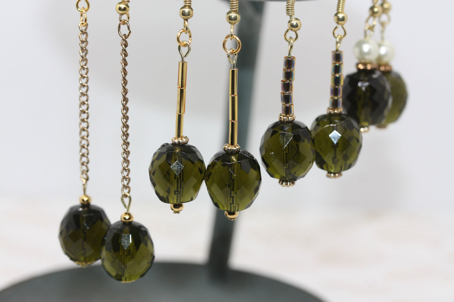 Your choice of faceted  green glass dangle earrings