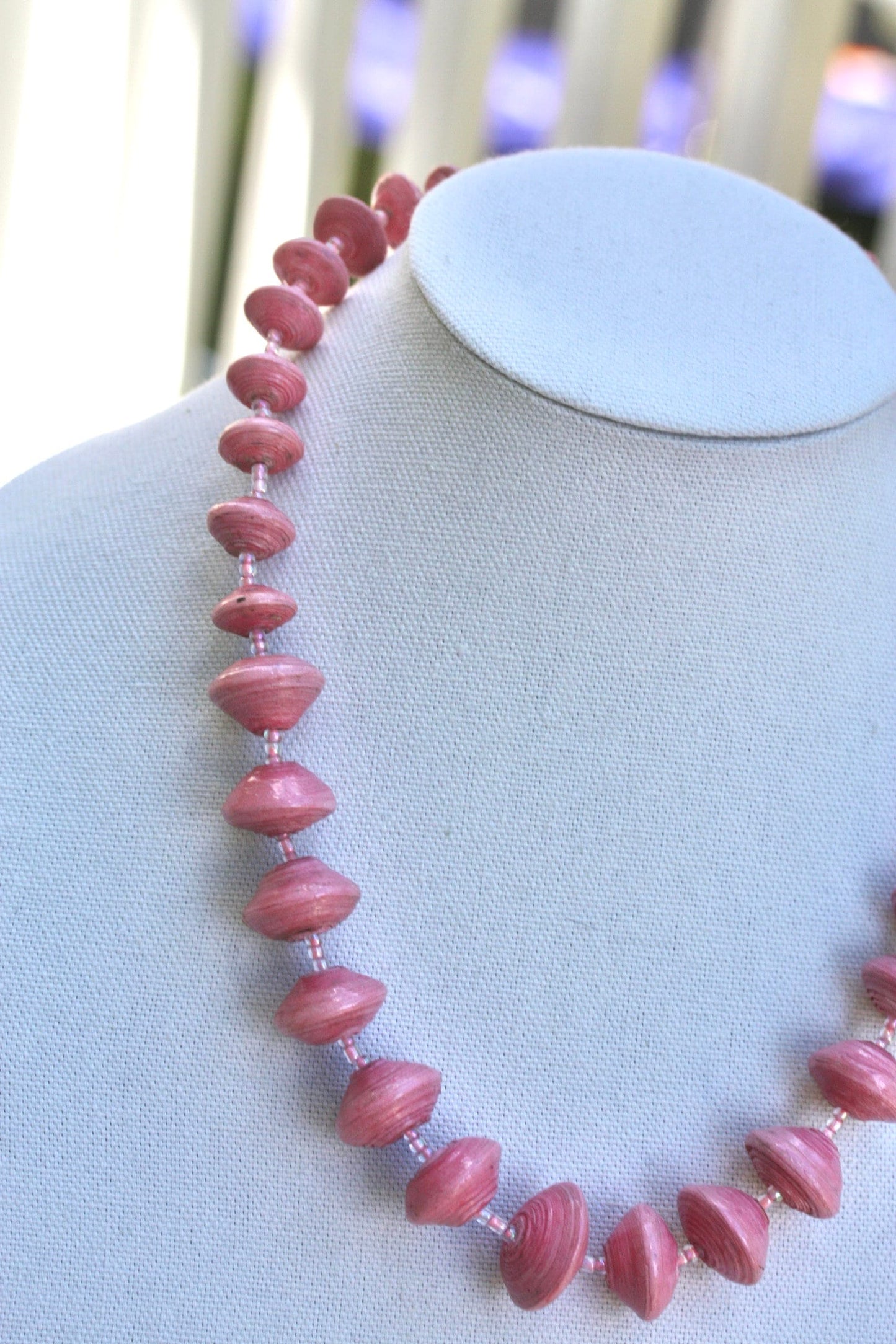 Long vintage various sized rolled paper light pink necklace