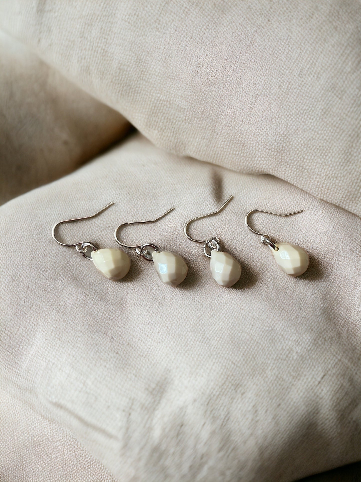 Small little "cream puff" simple easy to wear, go-with-everything dangle earrings