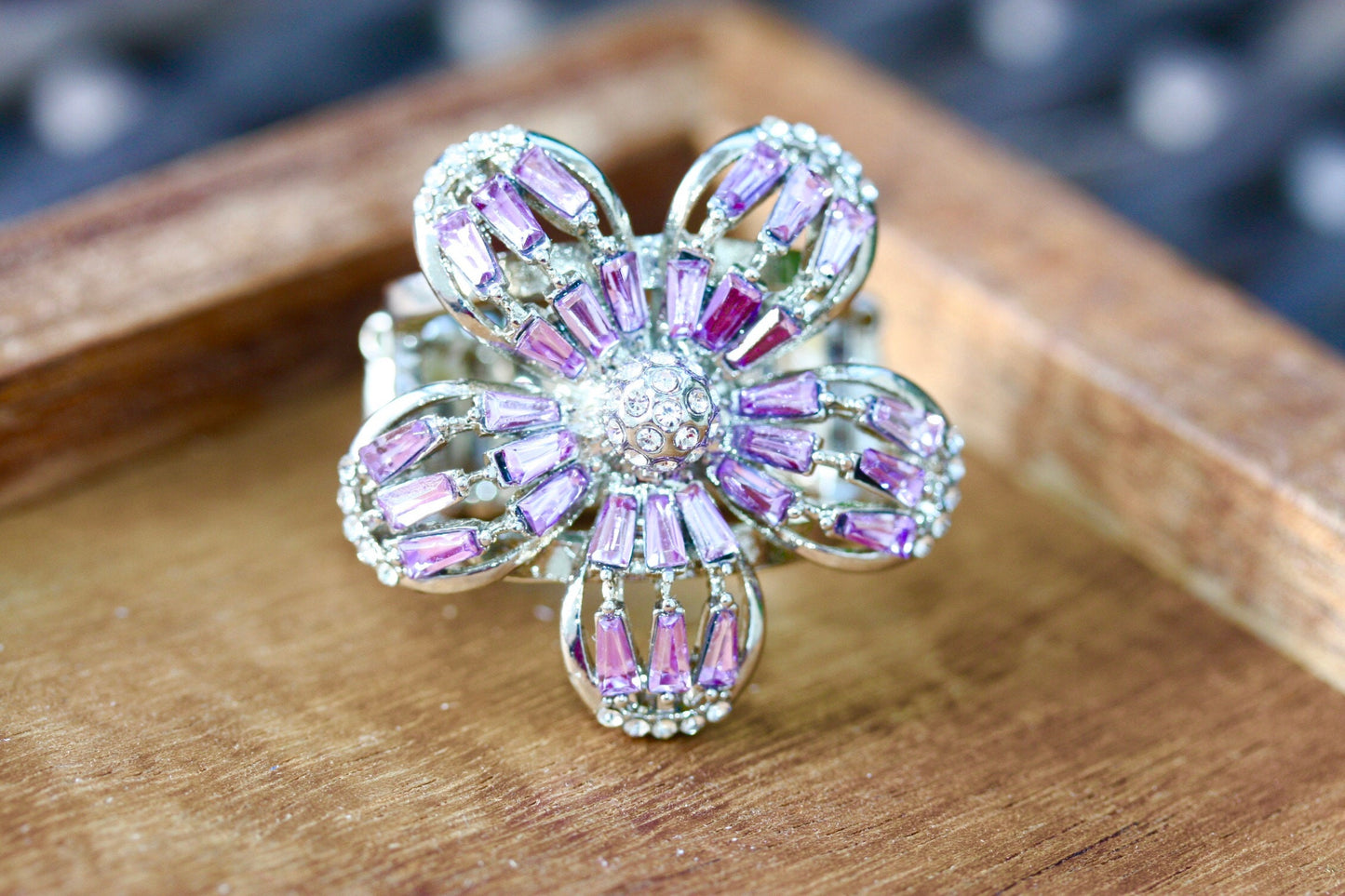 Stunning and unique vintage clear rhinestones and purple baguettes flower ring