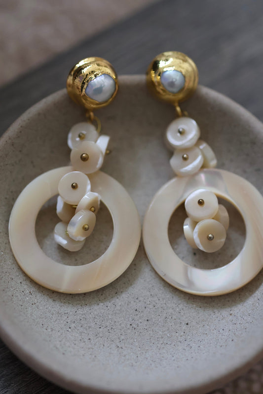 Very unique cream colored mother of pearl shell rounded hoop dangle earrings