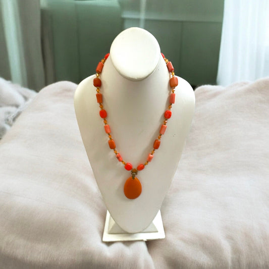 Stunning orange coral colored vintage beaded necklace