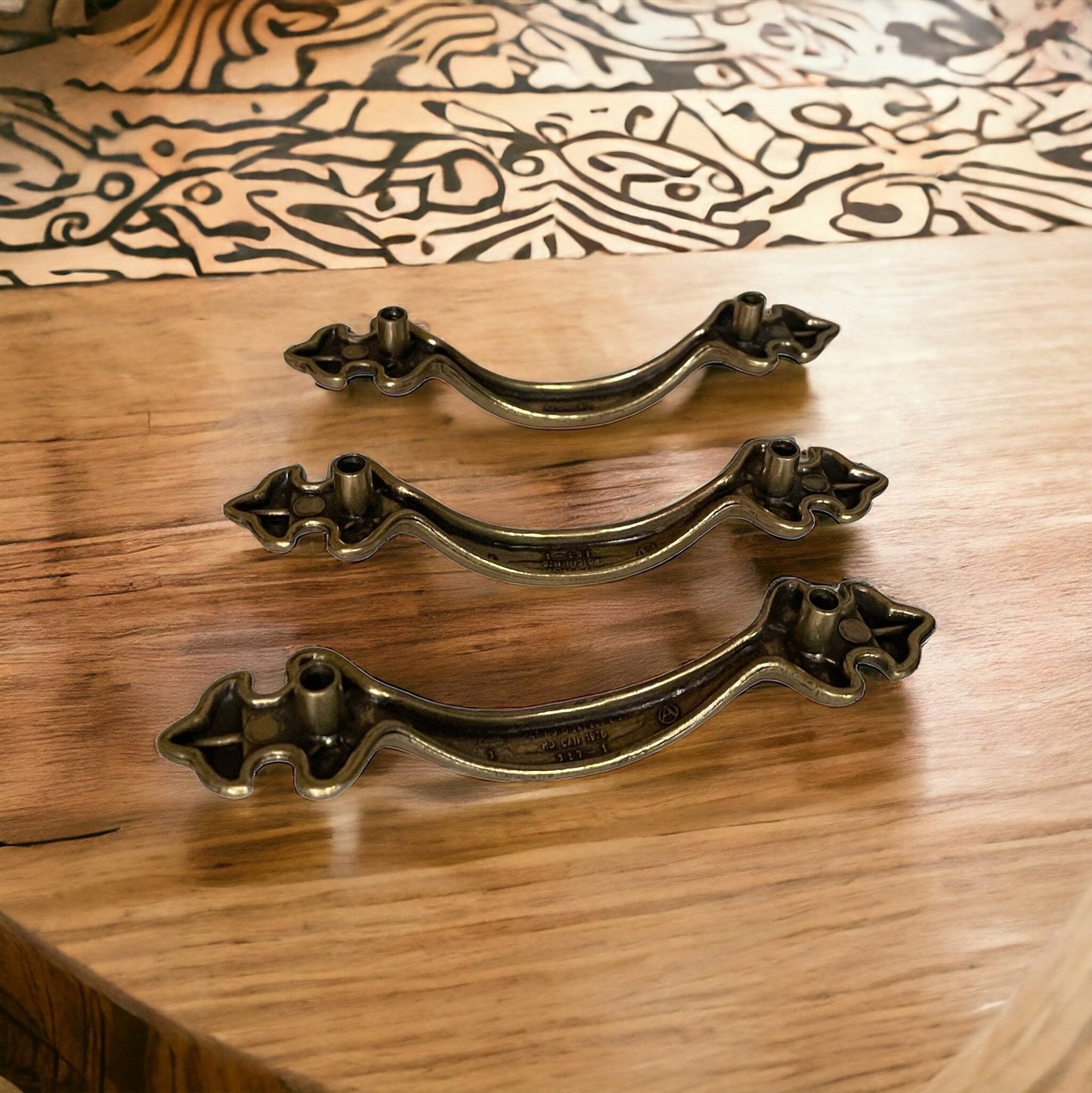 Set of three vintage brass? drawer pulls