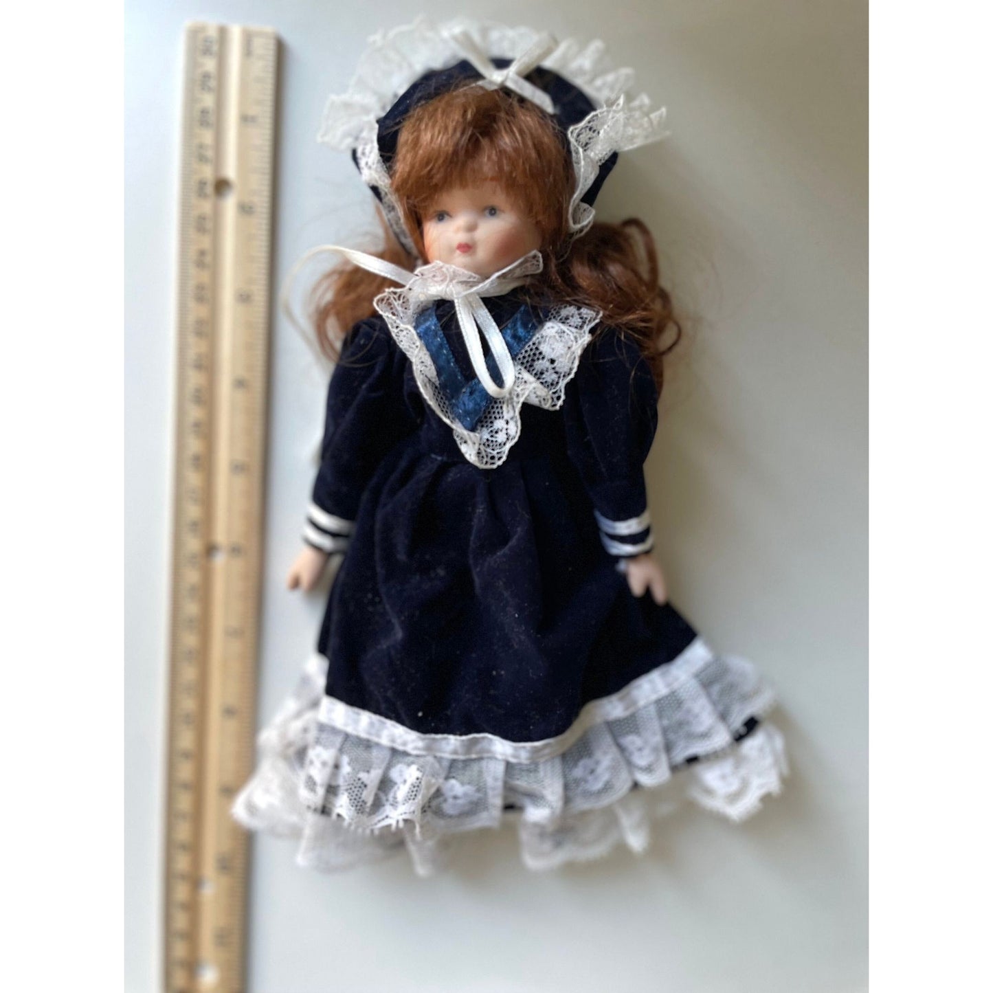 Vintage porcelain doll - red hair, royal blue velvet dress