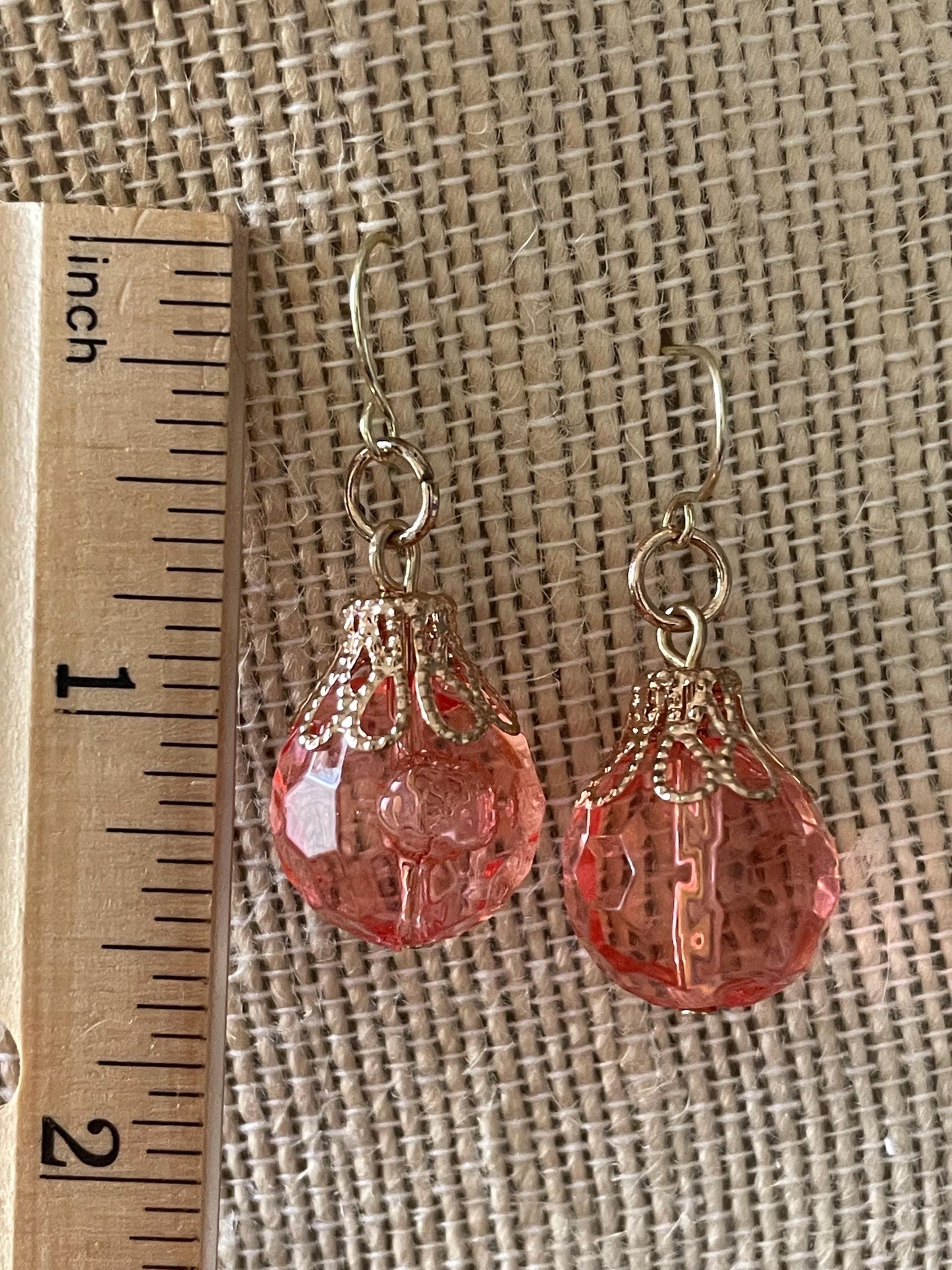 Pink faceted faux crystal earrings with goldstone filigree