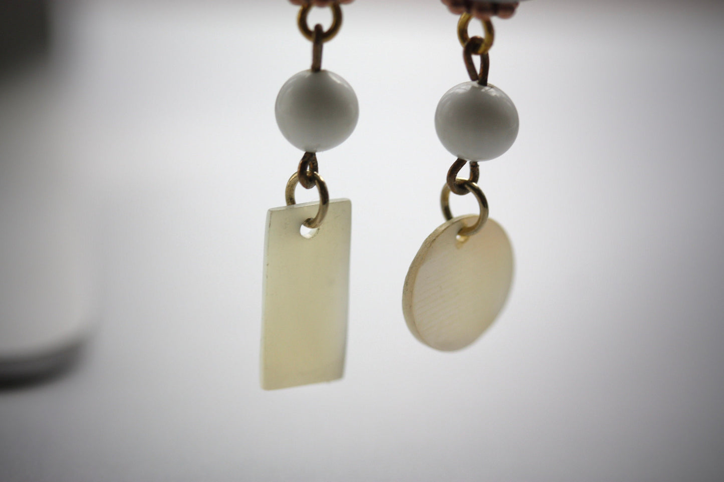 Long dangle earrings made of both new and vintage components -blue and gold art glass, mother of pearl dangles,vintage blue and white beads