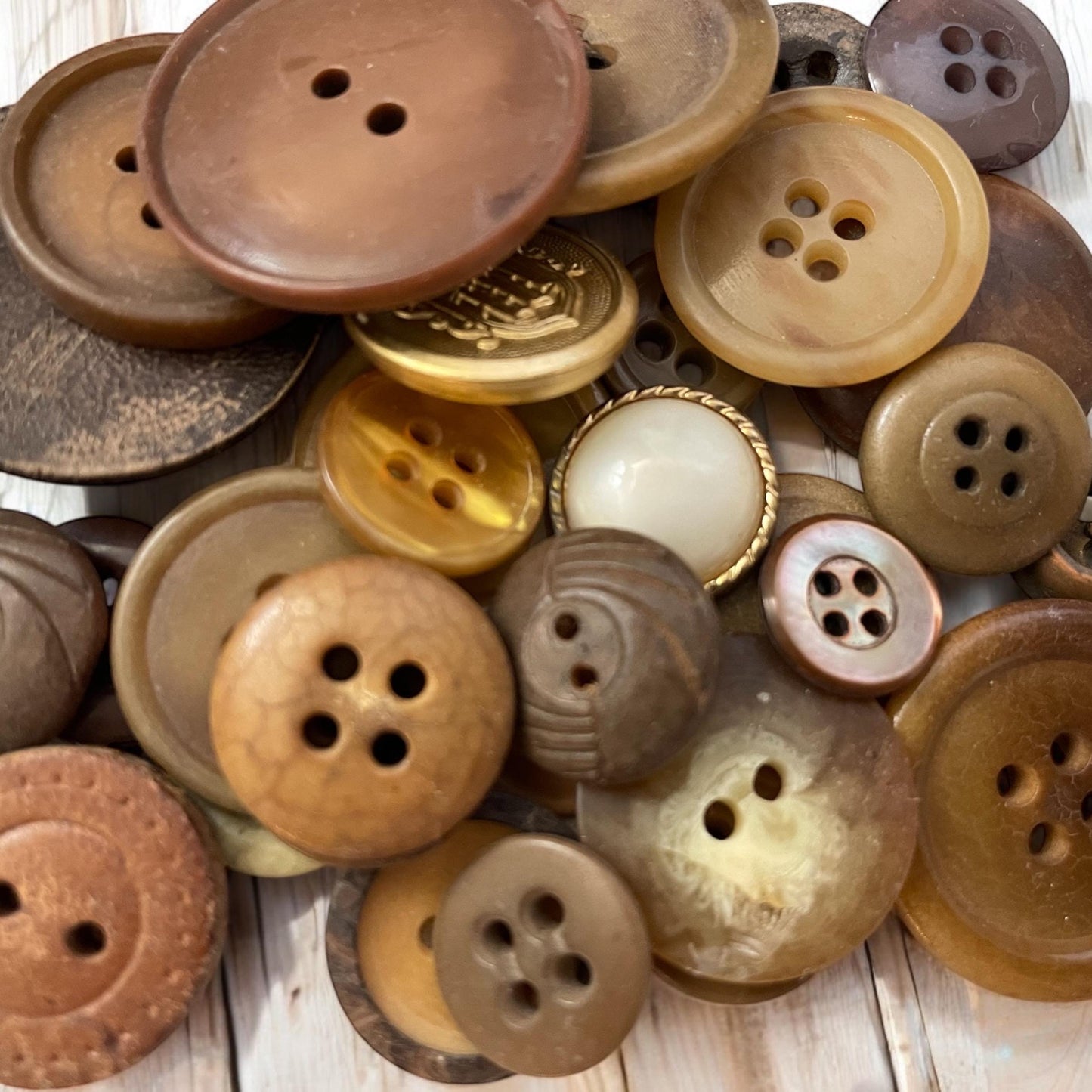 Buttons by the ounce - mystery lot of gold, brown, tan and cream vintage buttons - mixed sizes and materials - as found