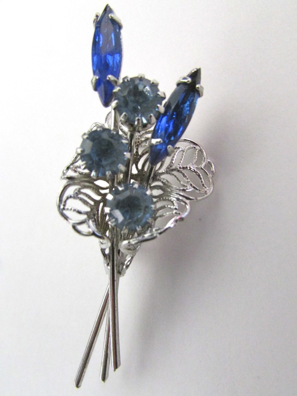 Charming vintage pin -  silver filigree bouquet of beautiful rhinestone & crystal flowers in shades of blue