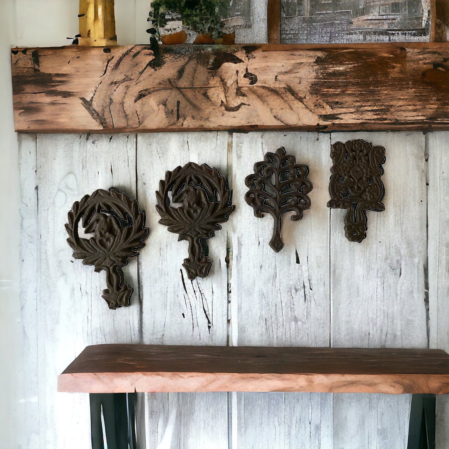 Set of 4 small cast iron trivets - vintage or antique?