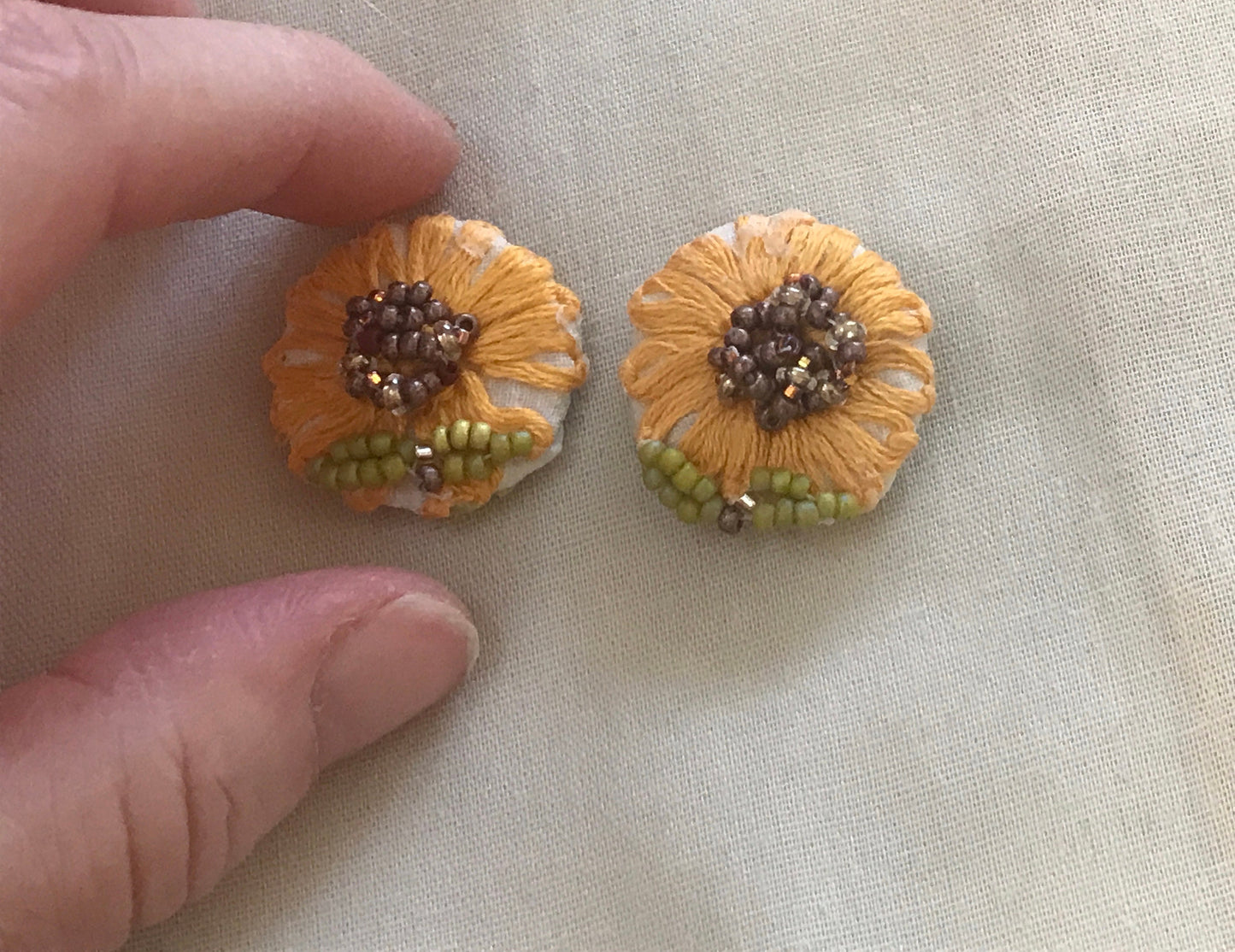 Upcycled sunflower earrings - embroidered flowers from vintage tablecloth surrounded by new, handmade beadwork - vintage and new materials