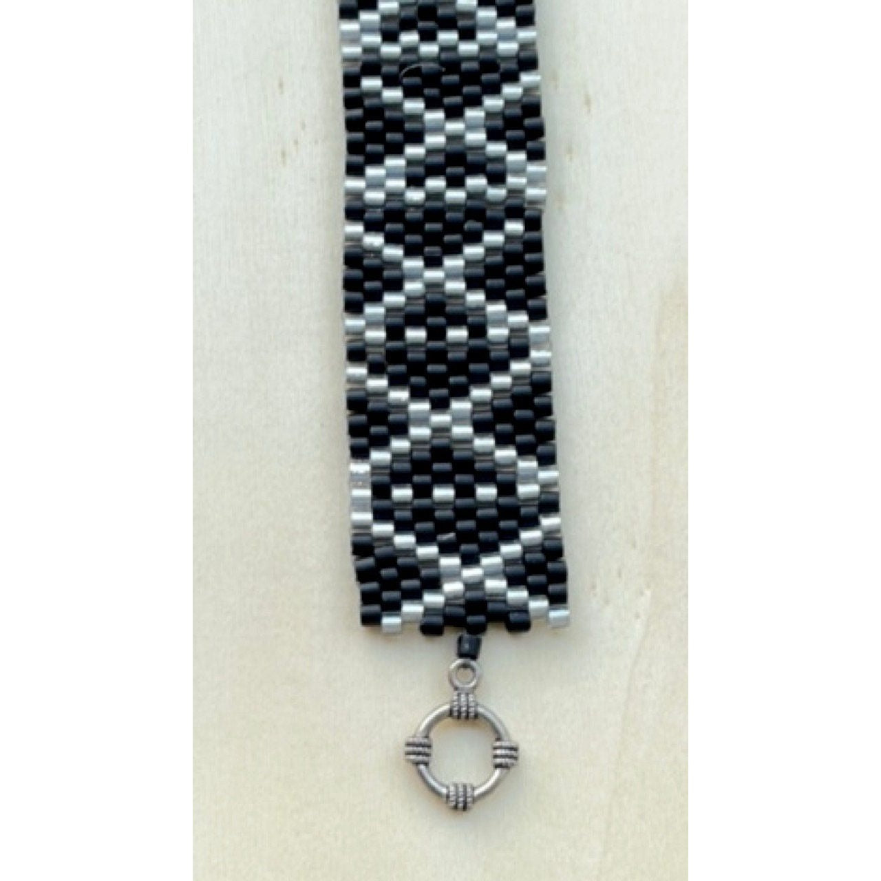 Stunning vintage silver and black hand woven vintage beadwork bracelet